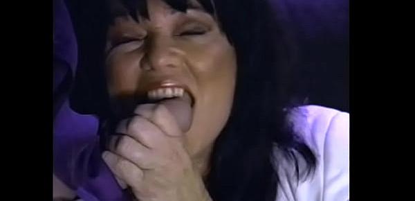 Mature brunette with big jugs Ginni Lewis wants more and more cocks in her holes